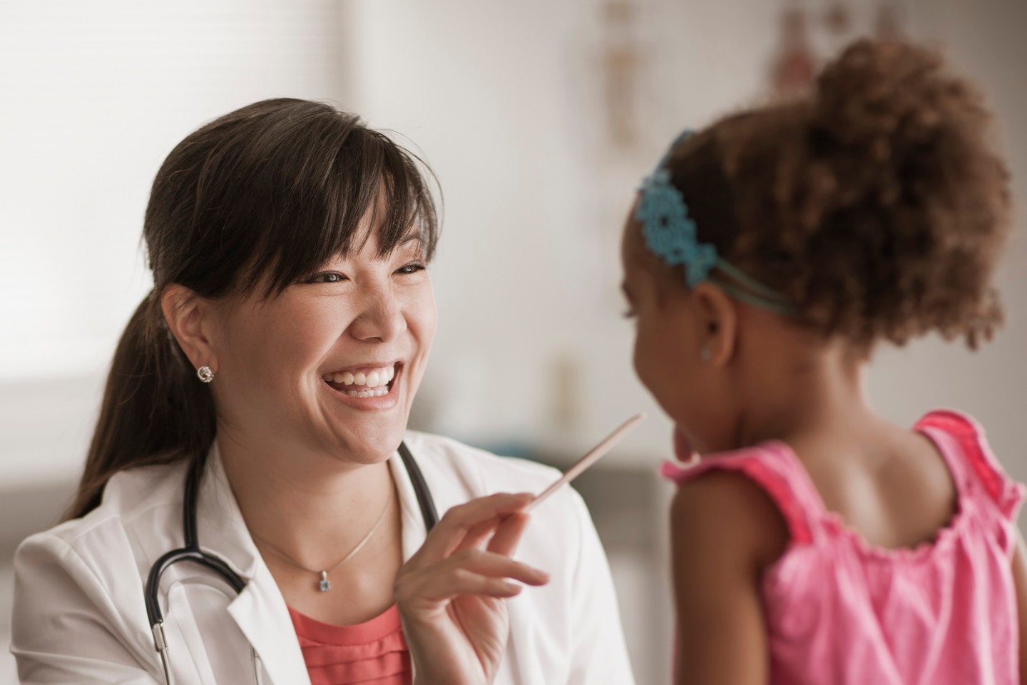 Doctors with young patient