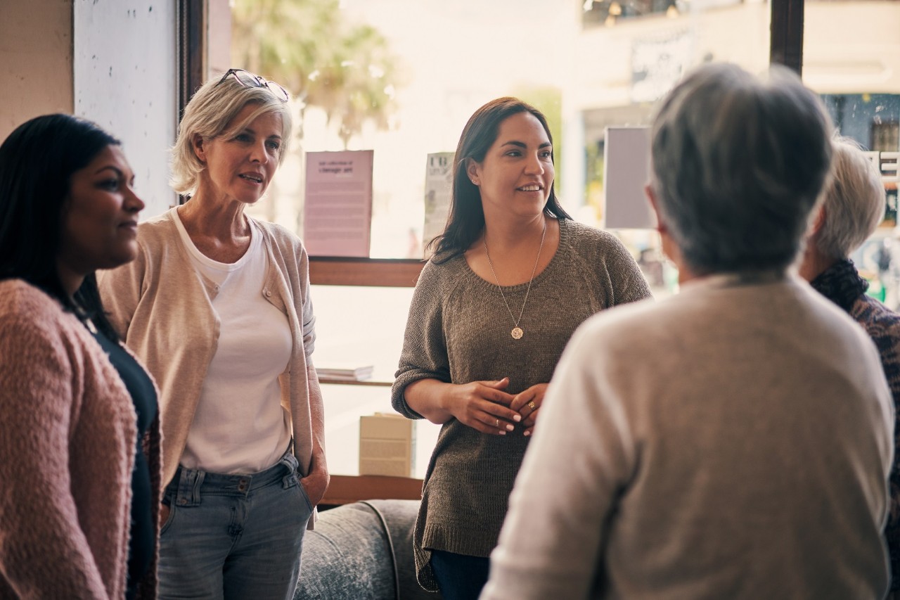 Group of women talking in a circle