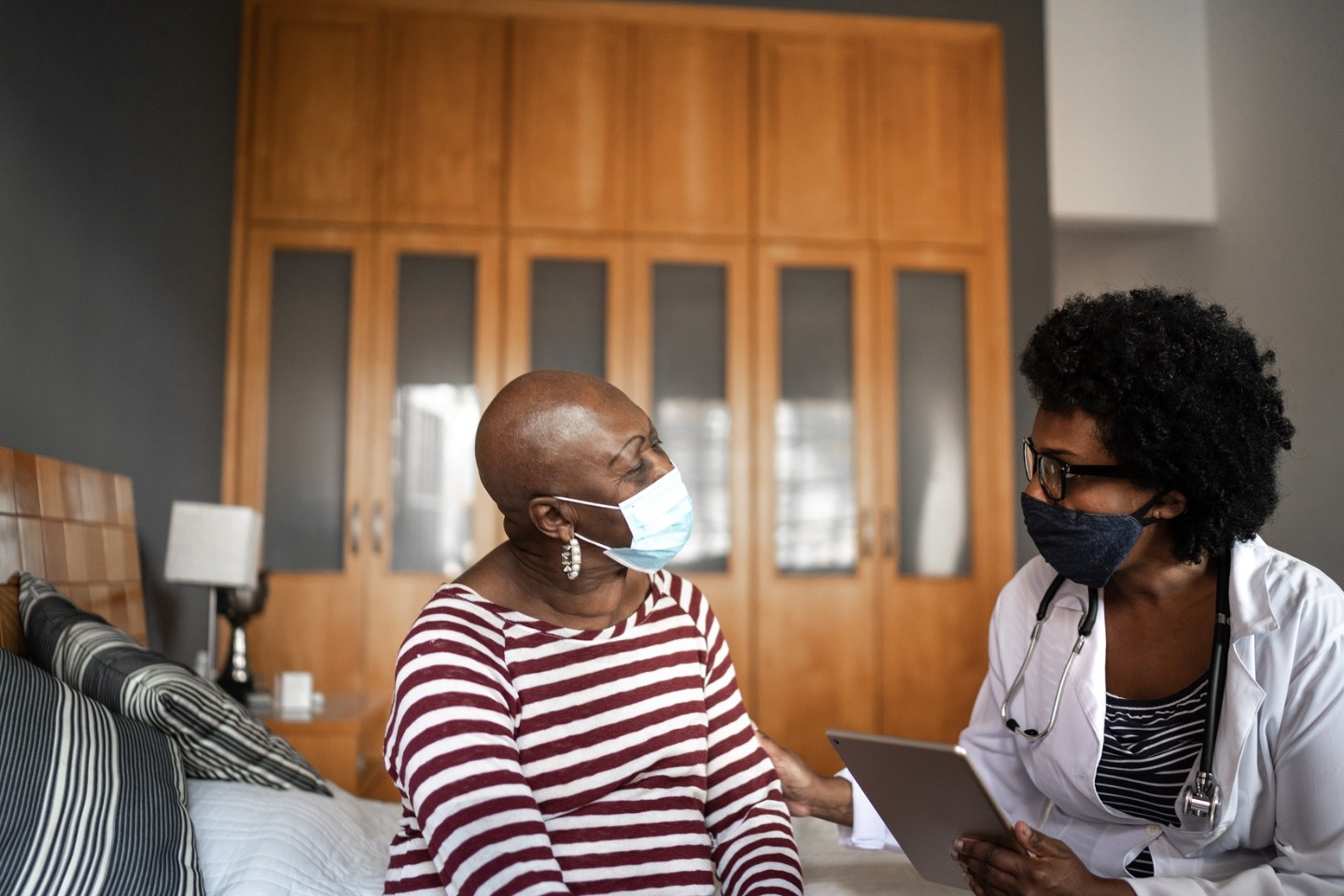 Doctor speaking with patient