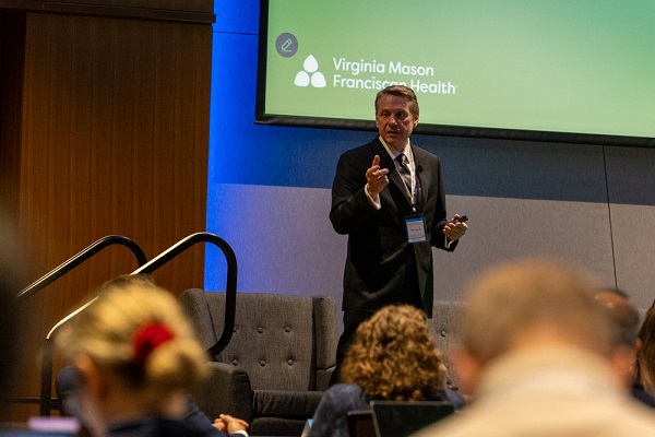 Digestive Health Symposium 2025 speaker talking to group